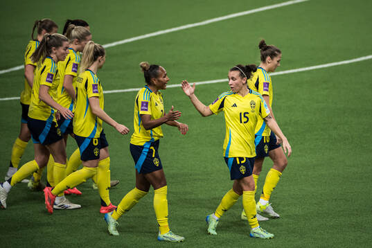 Madelen Janogy and Julia Zigiotti Olme of Sweden celebrating