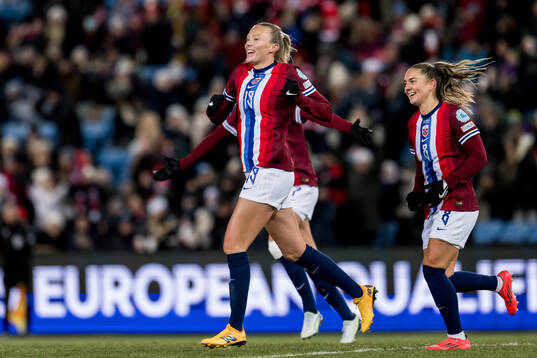 Synne Sofie Kinden Jensen of Norway celebrates scoring the 3-0 goal