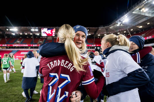 Ada Hegerberg and Cathinka Tandberg of Norway celebrate