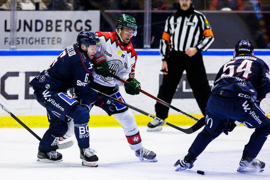 Linköpings Mattias Hävelid och Frölundas Linus Nässen