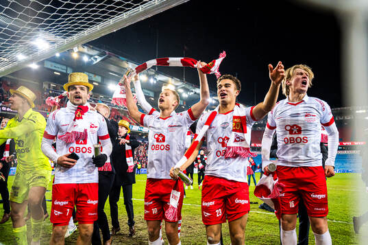 Brandur Hendriksson Olsen, Morten Bjørlo, Henrik Skogvold and Daniel Fritz Eid of Fredrikstad celebrates