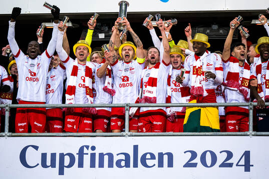 Fallou Fall, Stian Stray Molde, Julius Magnusson, Simen Rafn and Patrick Robert Metcalfe of Fredrikstad celebrates with the trophy