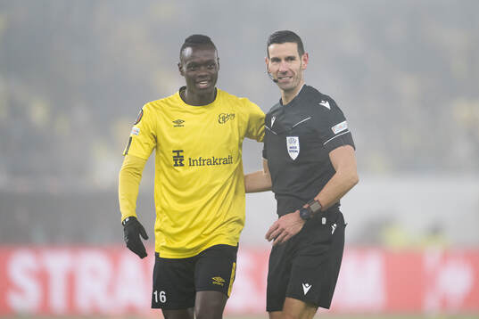 Timothy Noor Ouma of Elfsborg and referee Antonio Nobre