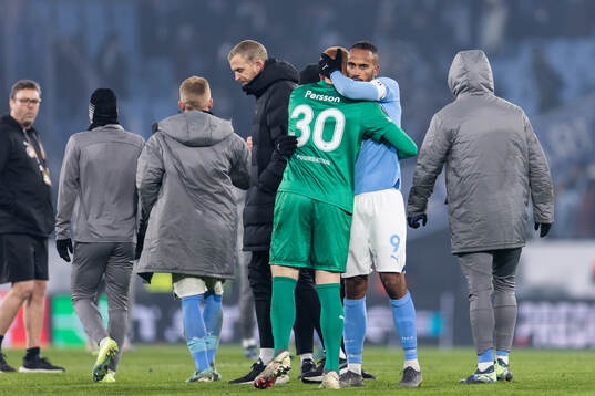 Goalkeeper Joakim Persson and Isaac Kiese Thelin of Malmö FF