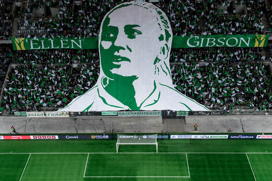 Supporters of Hammarby with a tifo dedicated to Ellen Gibson ahead of the UEFA Women's Champions League football match between Hammarby and Barcelona on December 12, 2024 in Stockholm. 