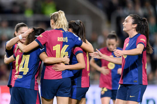 Aitana Bonmati of Barcelona celebrates with Fridolina Rolfö and Ingrid Engen after scoring 0-3