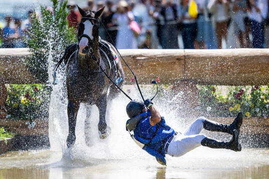 This picture is part of Bildbyrån’s selection of best sports photos from 2024. Originally published 240728 Ronald Zabala G of Ecuador with horse Forever Young Wundermaske crashes when competing in equestrian eventing cross country team and individual