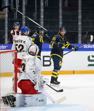 Lucas Wallmark and Mathias Bromé of Sweden celebrate in