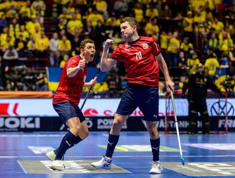 Jiri Besta and Milan Melis of Czech Republic celebrate the 8-2 goal