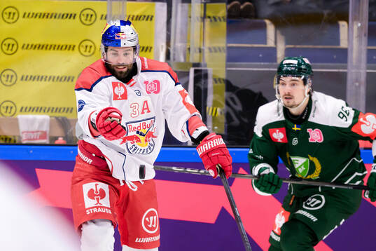 Peter Schneider of EC Red Bull Salzburg and David Tomasek