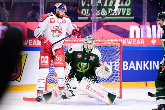 Thomas Raffl of EC Red Bull Salzburg and goaltender Maxime