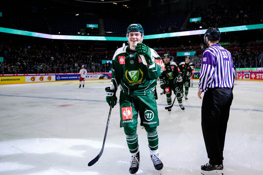 Alexander Ljungkrantz of Färjestad  celebrates