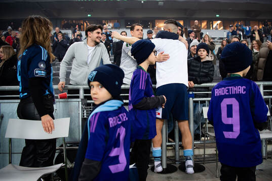 Haris Radetinac of Djurgården with his family after, his last game, the UEFA Conference League match between Djurgården and Legia Warszawa