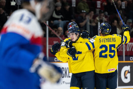 Rasmus Bergqvist and Otto Stenberg celebrate with Axel