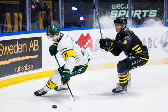 Björklövens Gustav Possler och AIKs Tom Hedberg
