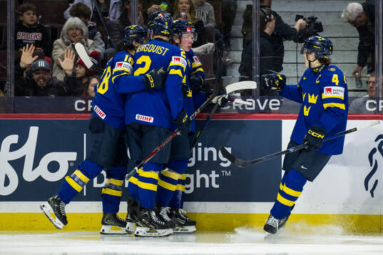 Otto Stenberg of Sweden celebrate with Victor Eklund, David