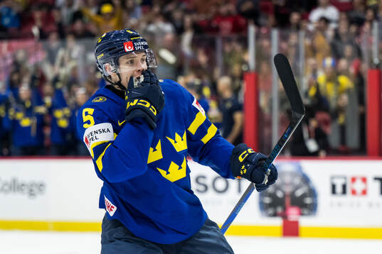 Wilhelm Hallquist of Sweden celebrates