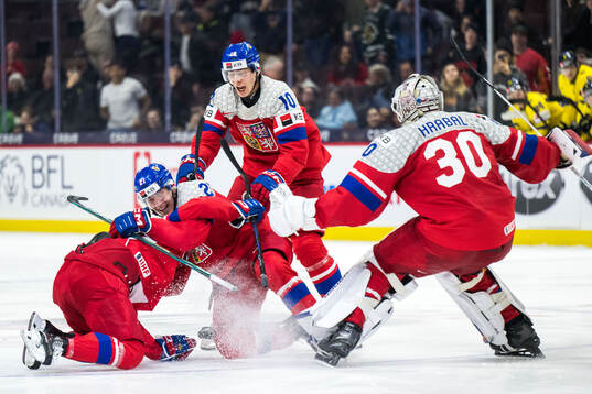 Eduard Sale, Jakub Stancl, Adam Jecho and goaltender