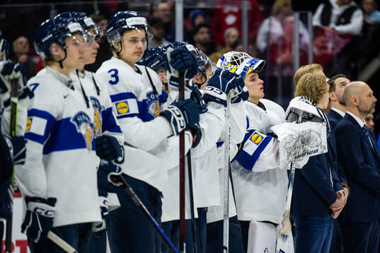 goaltender Petteri Rimpinen of Finland looks dejected