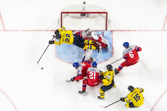 Anton Wahlberg of Sweden and goaltender Michael Hrabal of