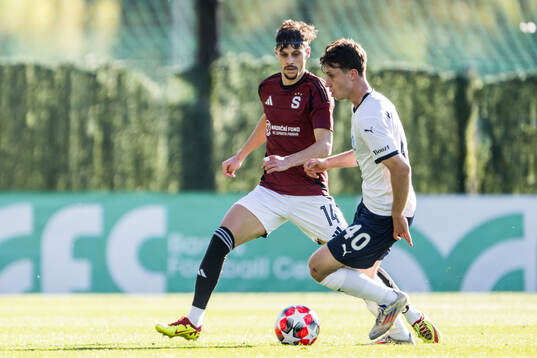 Veljko Birmancevic of Sparta Prag and Kenan Busuladzic of