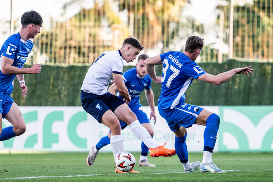 William Åkesson of Malmö FF and Marios Pourzitidis of Slovan Liberec