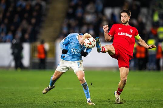 Otto Rosengren of Malmö FF and Ricky van Wolfswinkel of Twente