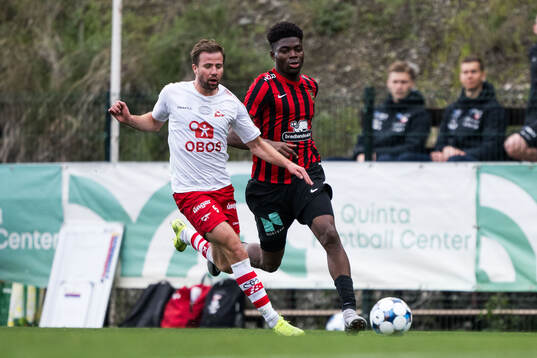 Simen Rafn of Fredrikstad and Ezekiel Alladoh of Brommapojkarna