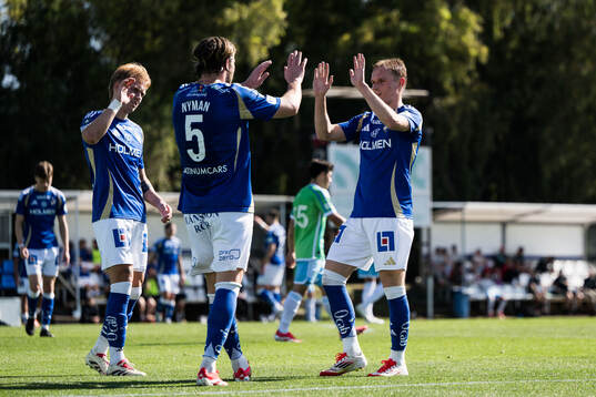 Isak Andri Sigurgeirsson, Christoffer Nyman and Marcus Baggesen of IFK Norrköping celebrates after 2-1