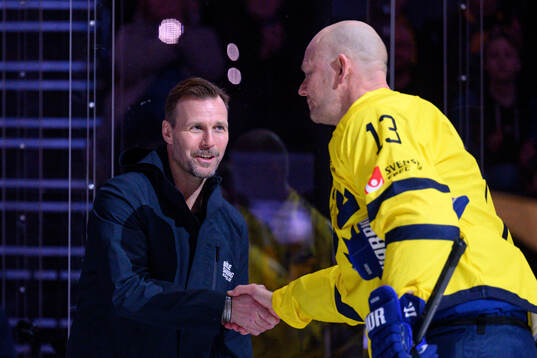 Ceremonial first puck with Anders Salming, Jari Kurri of