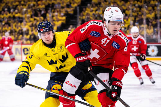 Lias Andersson of Sweden and Giancarlo Chanton of
