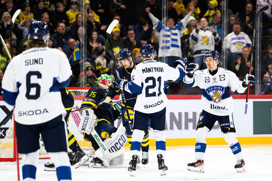 Matias Mäntykivi and Eemil Erholtz of Finland celebrate