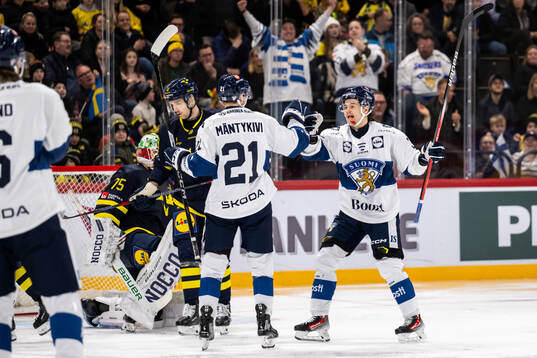 Matias Mäntykivi and Saku Maenalanen celebrate