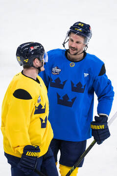 Gustav Nyquist and Erik Karlsson of Sweden at a practice