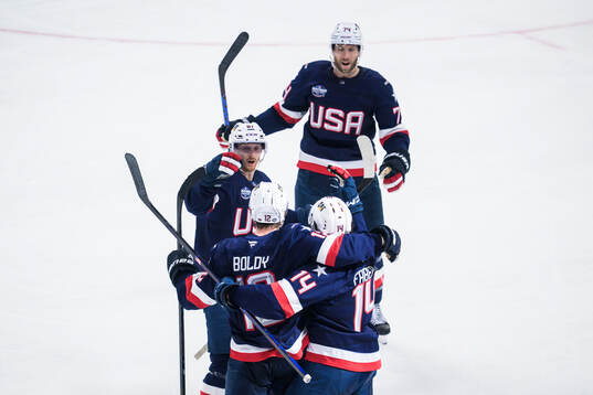 Kyle Connor, Matt Boldy, Brock Faber and Jaccob Slavin of