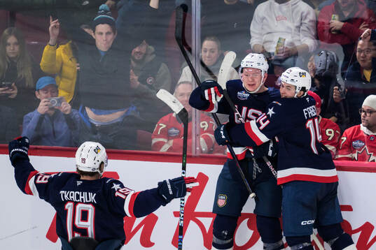 Matthew Tkachuk, Brady Tkachuk and Brock Faber of USA