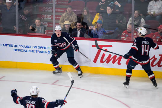 Matthew Tkachuk, Brady Tkachuk and Brock Faber of USA