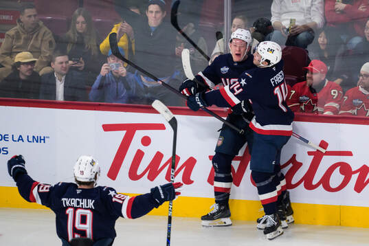 Matthew Tkachuk, Brady Tkachuk and Brock Faber of USA