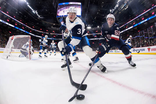 Olli Määttä of Finland and Jake Guentzel of USA