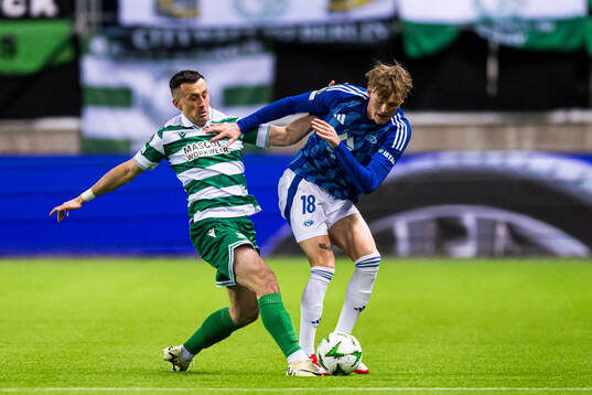 Aaron McEneff of Shamrock Rovers and Halldor Stenevik of