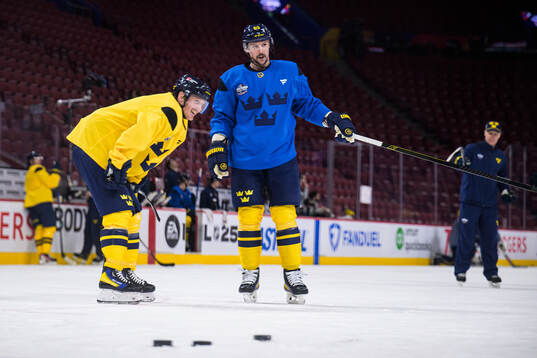 Gustav Nyquist and Erik Karlsson of Sweden at a practice