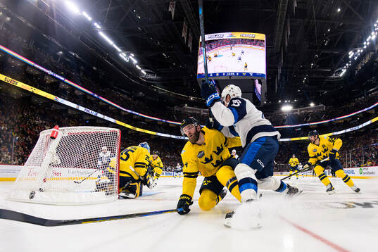 Mattias Ekholm of Sweden in action against Anton Lundell of