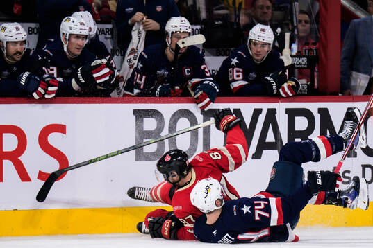 Sidney Crosby of Canada and Jaccob Slavin of USA