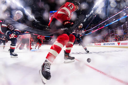 Zach Werenski and Auston Matthews of USA are being