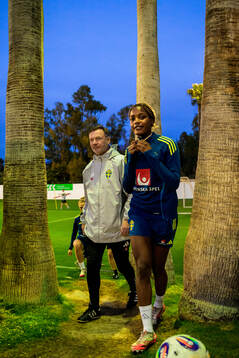 Head coach Peter Gerhardsson and Evelyn Ijeh