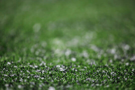 Snö och is på konstgräs