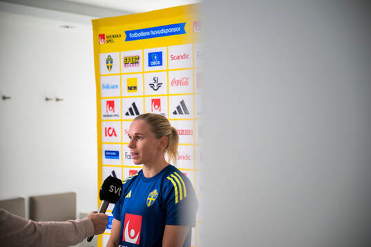Jonna Andersson of the women’s national football team of Sweden is interviewed by the media