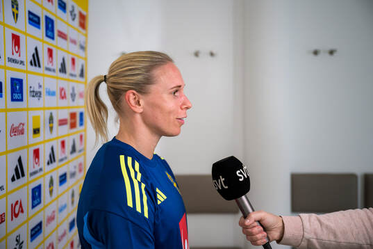 Jonna Andersson of the women’s national football team of Sweden is interviewed by the media