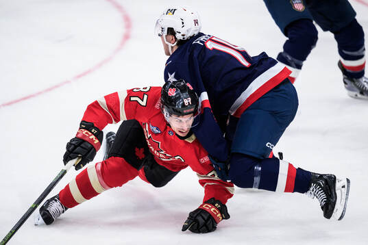 Sidney Crosby of Canada and Brock Faber of USA