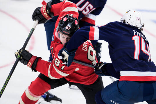 Sidney Crosby of Canada and Brock Faber of USA